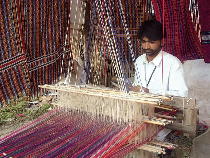 participants of lok mela folk festival busy in what they do best at the final day of the festival photos express