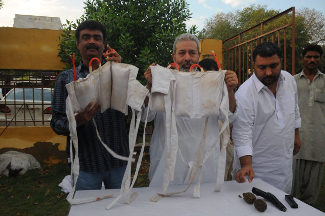 ssp cid chaudhry alsam khan displays the suicide jacket that they recovered from the possession of an alleged ttp extremist photo mohammad saqib express ssp cid chaudhry alsam khan displays the suicide jacket that they recovered from the possession of an alleged ttp extremist photo mohammad saqib express