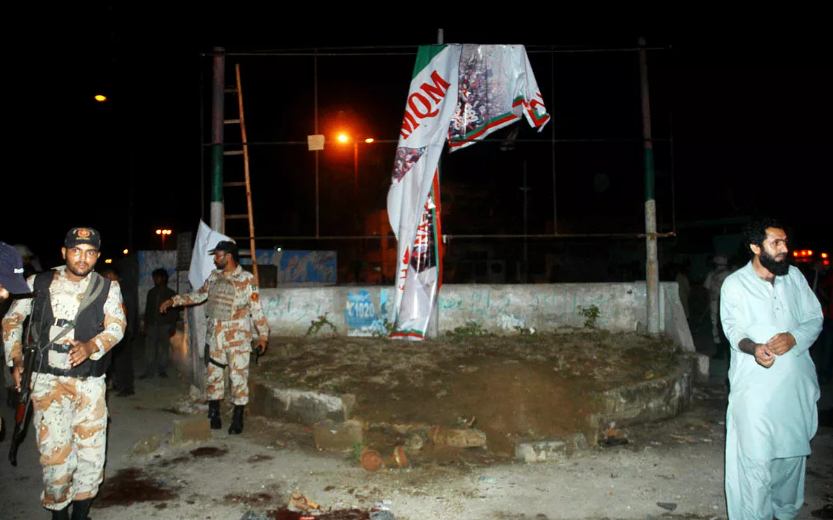 security officials stand guard near the site of karachi bomb attack photo online security officials stand guard near the site of karachi bomb attack photo online