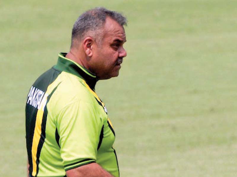 whatmore had detailed discussions with camp commandant wasim akram and pakistan bowling coach mohammad akram photo afp file