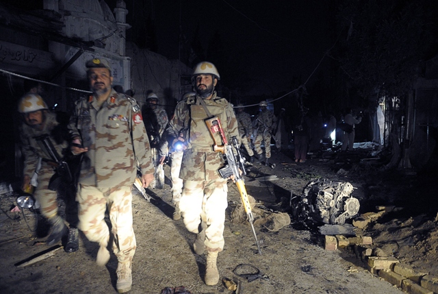 pakistani paramilitary soldiers examine the site of a suicide bomb attack in quetta on april 23 2013 photo afp