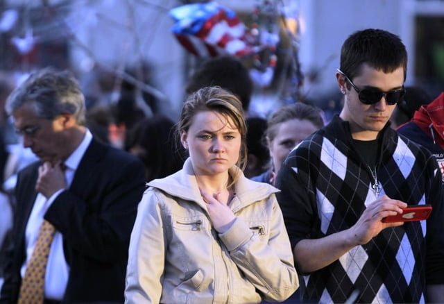 a woman pauses as she looks at a memorial for the victims of the boston marathon bombings on boylston street in boston photo reuters a woman pauses as she looks at a memorial for the victims of the boston marathon bombings on boylston street in boston photo reuters