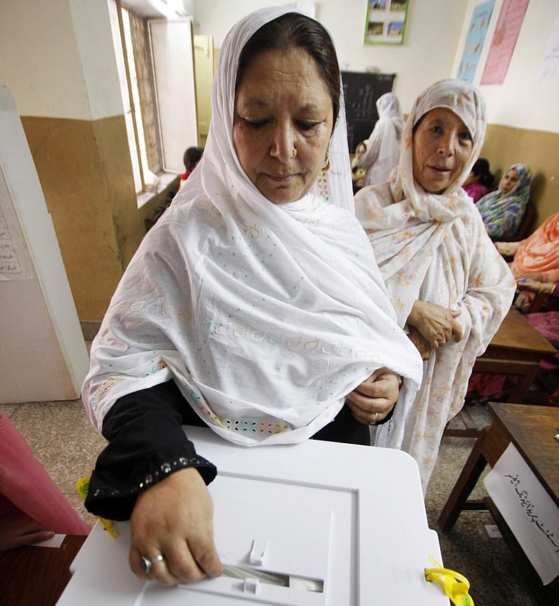 a female voter casting her vote during the by elections of pp 13 in rawalpindi photo online