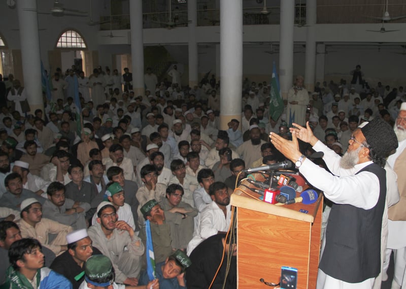 ji chief syed munawar hasan s addressed a political gathering in a mosque on university road in peshawar wednesday afternoon photo iqbal haider