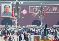 us and chinese national flags flutter next to the portrait of late chinese chairman mao zedong as people visit tiananmen square ahead of us president donald trump s visit to china in beijing photo reuters