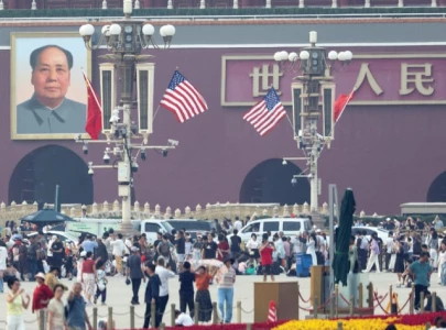 trump arrives in beijing for superpower summit