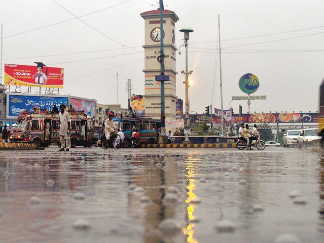 the ao tower in north nazimabad on a rainy day many amenity plots near it have been taken over by businesses or converted into residential areas photo file the ao tower in north nazimabad on a rainy day many amenity plots near it have been taken over by businesses or converted into residential areas photo file