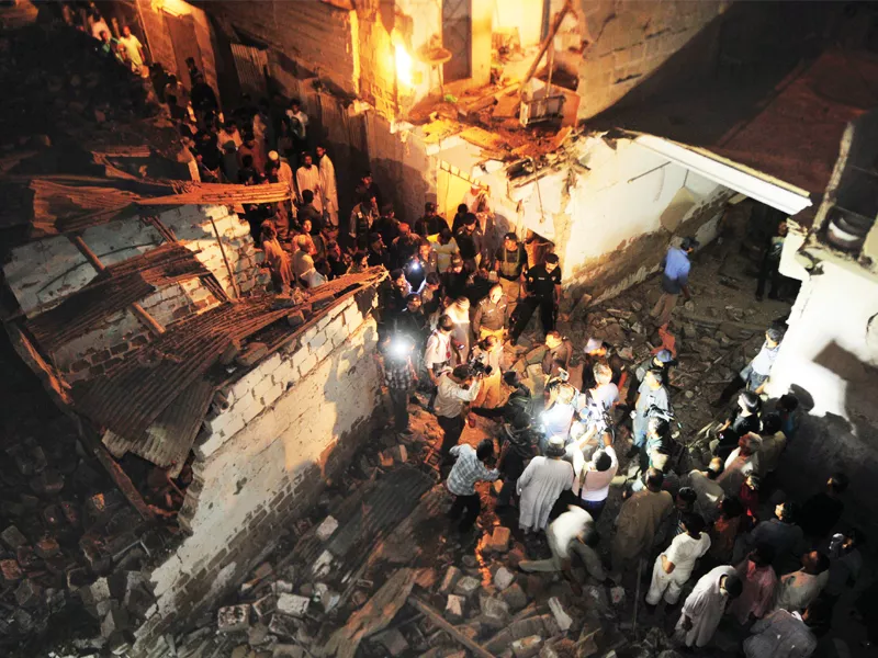 people gathered outside a party office which was attacked on saturday night six people were killed when two back to back blasts took place outside the mqm office in orangi town while a third rocked a ppp corner meeting in lyari photo online people gathered outside a party office which was attacked on saturday night six people were killed when two back to back blasts took place outside the mqm office in orangi town while a third rocked a ppp corner meeting in lyari photo online