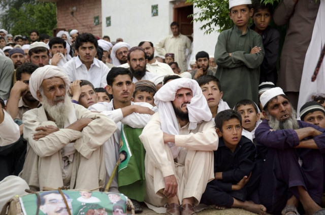 supporters of salim saifullah khan the candidate for the national assembly for the pakistan muslim league n pml n listen as he addresses them during an election campaign meeting in langer khel village in lakki marwat photo afp supporters of salim saifullah khan the candidate for the national assembly for the pakistan muslim league n pml n listen as he addresses them during an election campaign meeting in langer khel village in lakki marwat photo afp