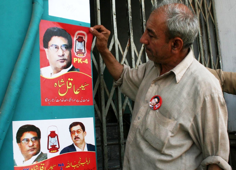 a handwritten letter in pashtu ordered removal of party banners and flags