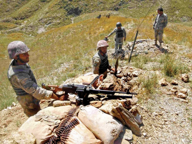 afghan border policemen take their positions at the goshta district of nangarhar province where afghanistan shares borders with pakistan photo reuters