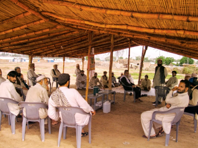 the idps of jalozai camp gather under a shed for an election gathering photo asad zia express the idps of jalozai camp gather under a shed for an election gathering photo asad zia express