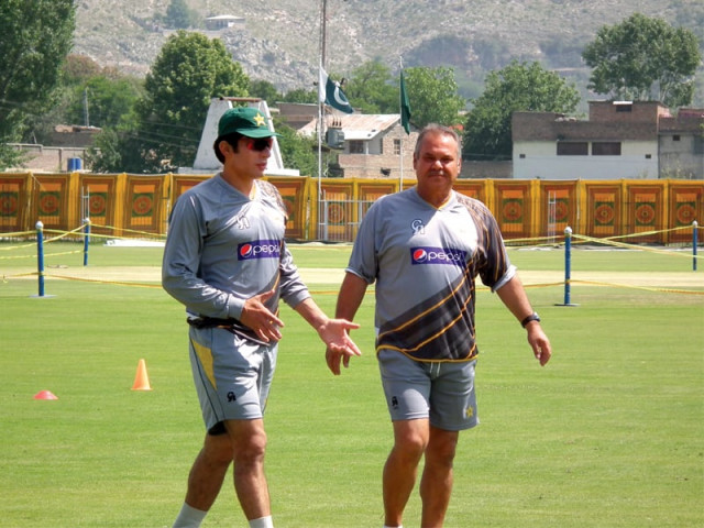 misbah and whatmore are seen planning strategies and having discussions while hafeez has been training on his own during the abbottabad camp photo pcb misbah and whatmore are seen planning strategies and having discussions while hafeez has been training on his own during the abbottabad camp photo pcb