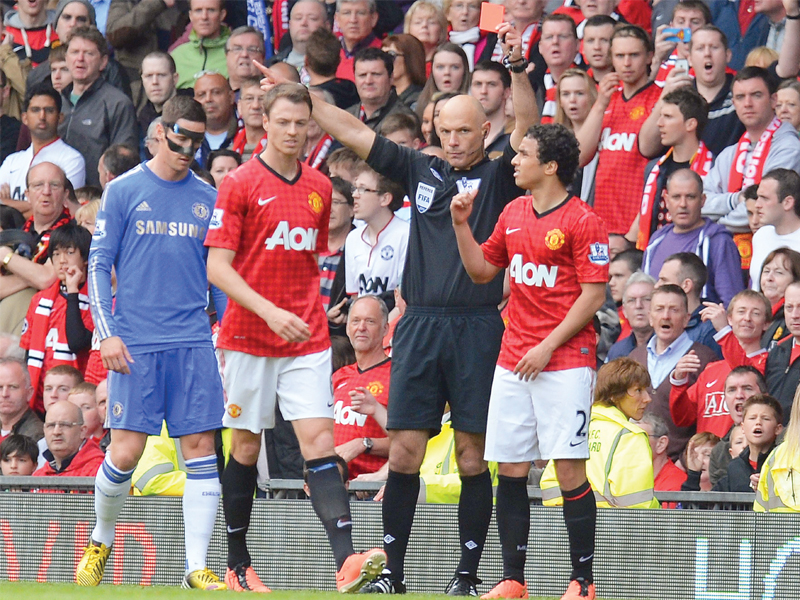 united were incensed after rafael s sending off claiming that chelsea players had pressured the referee into the decision photo afp