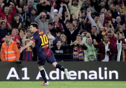 messi edges barca closer to title