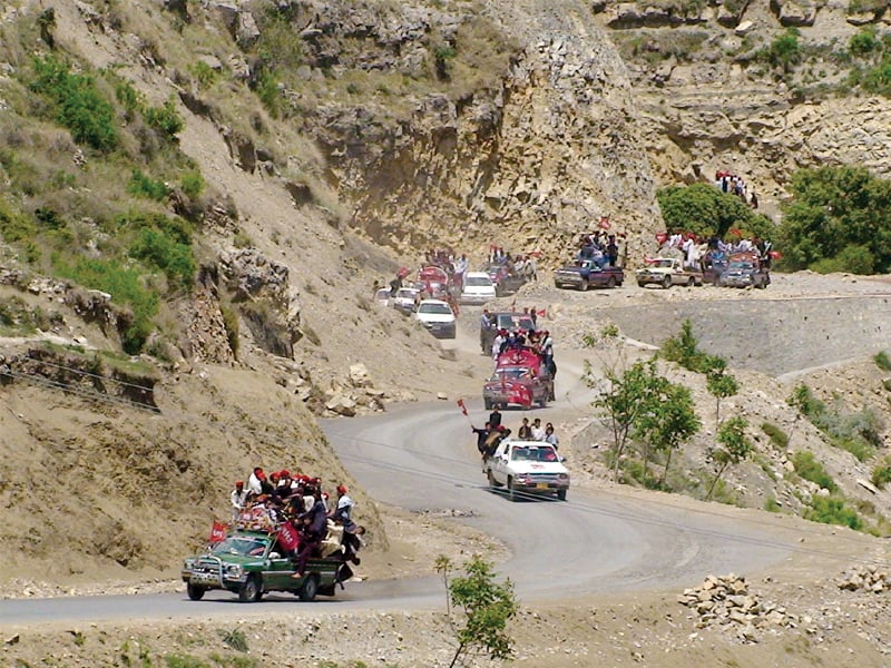 hoisting anp flags and sporting symbolic red caps activists drove 46 kilometres from kuraiz to kalaya headquarters of lower orakzai in support of their candidate for na 39 photo express