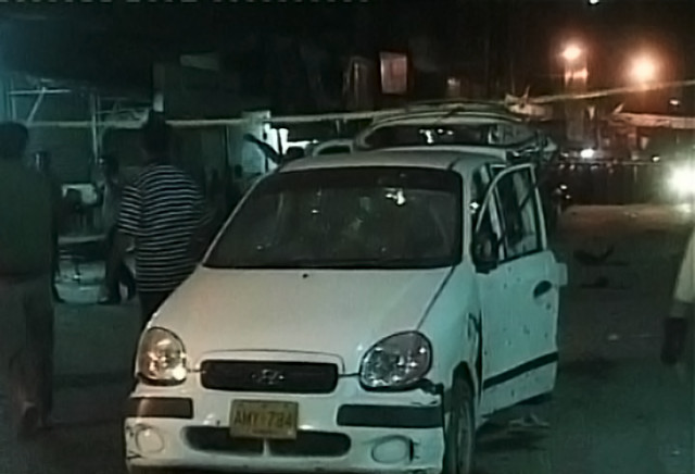 three cars were damaged by the blast in mehmoodabad karachi photo express three cars were damaged by the blast in mehmoodabad karachi photo express