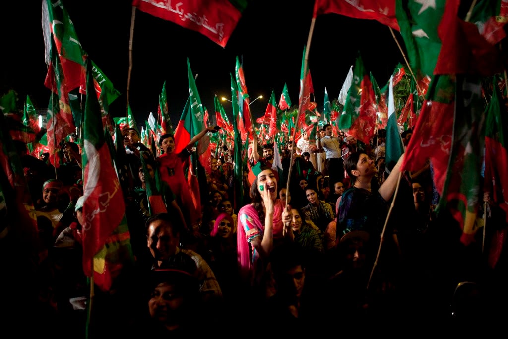 a young woman chants slogans in support of cricketer turned politician imran khan at a rally for his party pakistan tehreek e insaaf on may 9 2013 in islamabad photo myra iqbal express