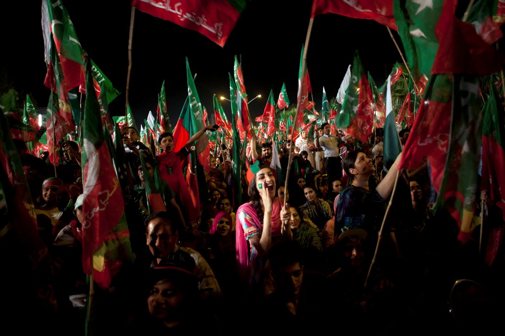 a young woman chants slogans in support of cricketer turned politician imran khan at a rally for his party pakistan tehreek e insaaf on may 9 2013 in islamabad photo myra iqbal express