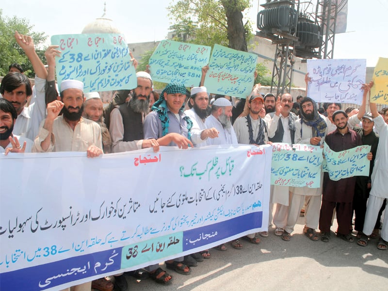 protesters demanded elections be postponed until displaced persons return to their hometowns photo muhammad iqbal express