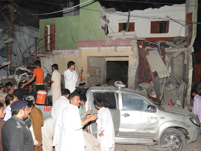 a building damaged in the blast on awami national party s anp corner meeting in orangi town s quaid e awan colony on april 26 attacks such as this one have generated a lot of fear among the party s members forcing them to think about leaving the country photo file