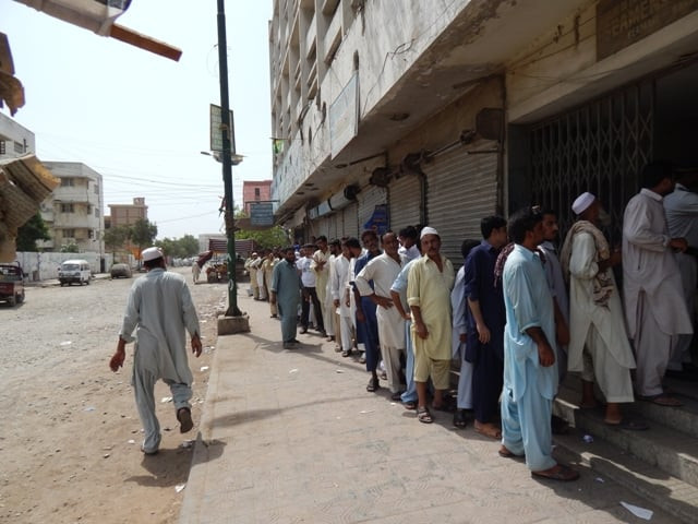 the polling agents stopped the polling at some polling stations of the na 239 for few minutes until the police cleared it photo sohail khattak
