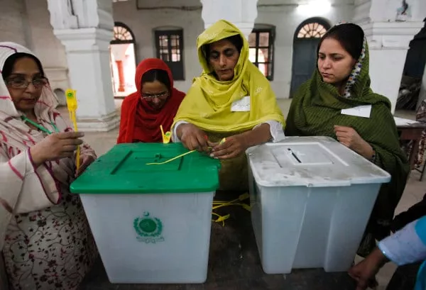 an election official seals a ballot box before the start of voting at a polling station in rawalpindi photo j0an0farc an election official seals a ballot box before the start of voting at a polling station in rawalpindi photo j0an0farc
