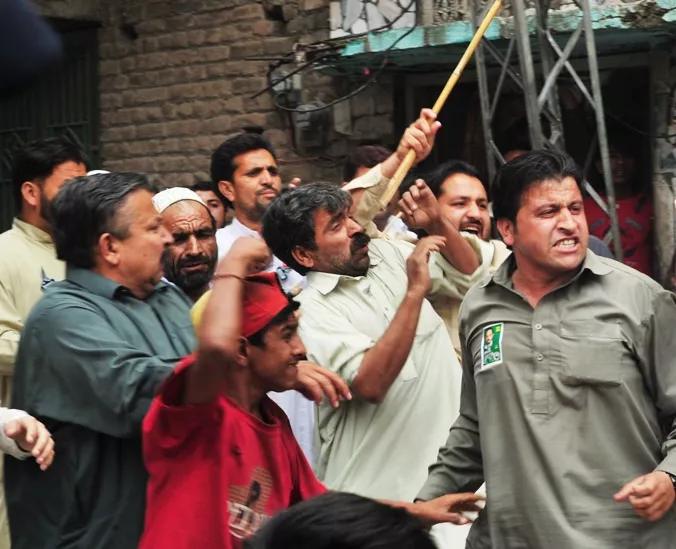 quot mqm workers are openly displaying arms and torturing people quot photo afp file quot mqm workers are openly displaying arms and torturing people quot photo afp file