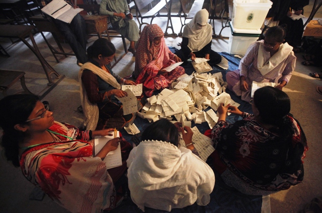 election workers count ballots after polls closed for general elections in karachi may 11 2013 photo reuters