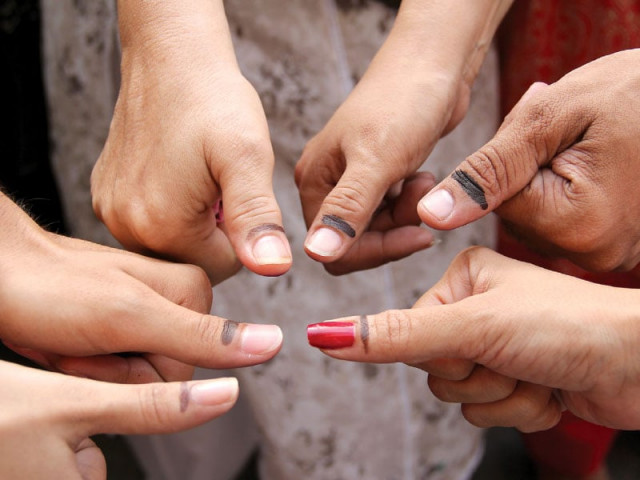 voters showing their inked thumbs photo ayesha mir express voters showing their inked thumbs photo ayesha mir express