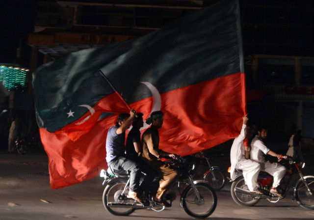 pti supporters carry their party flags as they take part in a rally in rawalpindi on may 12 2013 photo afp pti supporters carry their party flags as they take part in a rally in rawalpindi on may 12 2013 photo afp