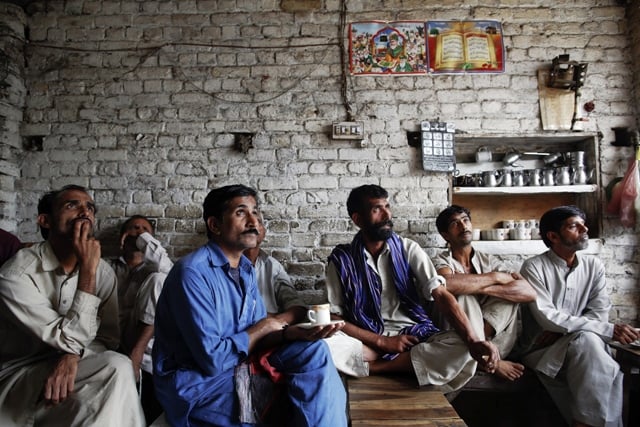 people in a traditional tea shop wait in anticipation of the election results photo reuters