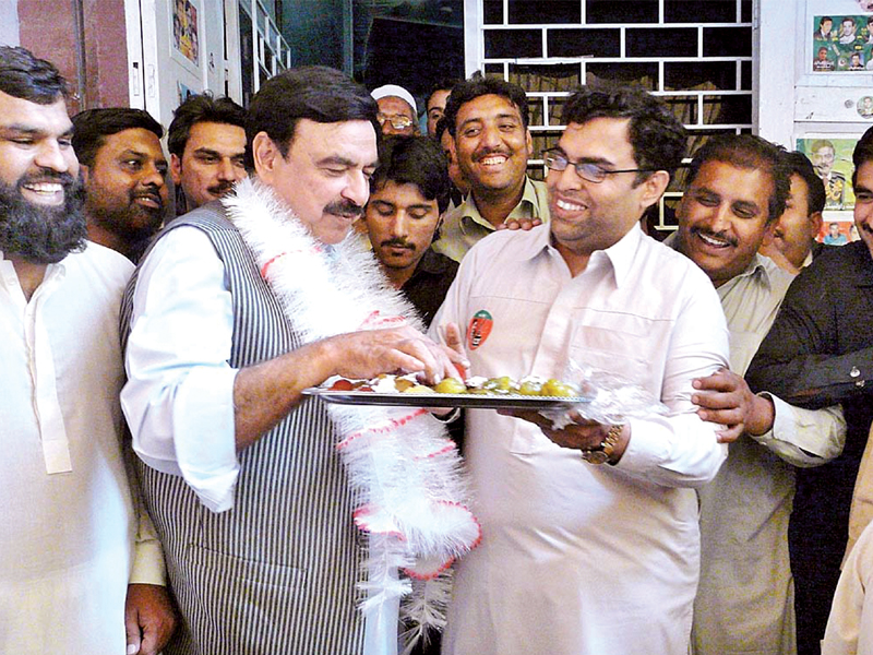 sheikh rashid ahmed celebrates his triumph with supporters photo app