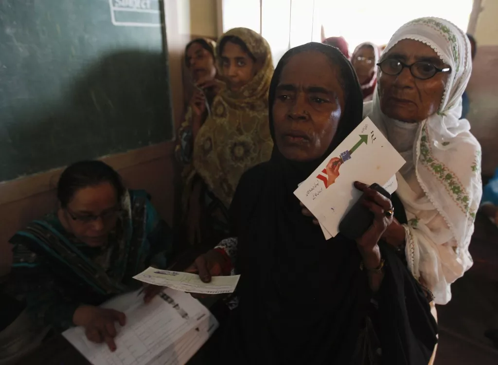 women voters one c holding an election flyer for the pakistan people 039 s party ppp wait for their turn to cast their vote at a polling station in karachi may 11 2013 photo reuters women voters one c holding an election flyer for the pakistan people 039 s party ppp wait for their turn to cast their vote at a polling station in karachi may 11 2013 photo reuters