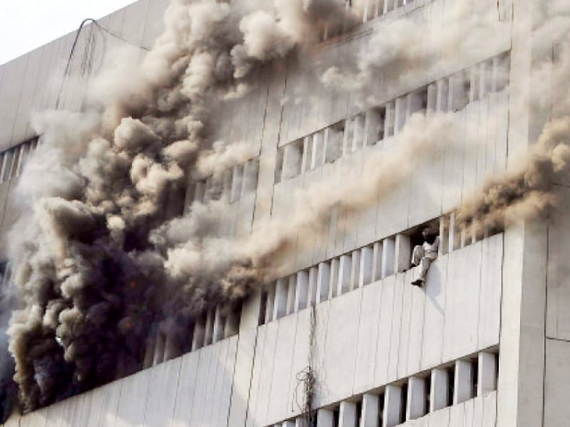 quot when fire fighters entered the building they found used fire extinguishers on the seventh floor quot rescue 1122 pro photo shafiq malik abid nawaz express quot when fire fighters entered the building they found used fire extinguishers on the seventh floor quot rescue 1122 pro photo shafiq malik abid nawaz express