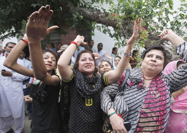 supporters of nawaz sharif not pictured leader of the pakistan muslim league nawaz pml n political party shout slogans upon his arrival to cast his vote for the general election at a polling station in lahore may 11 2013 photo afp supporters of nawaz sharif not pictured leader of the pakistan muslim league nawaz pml n political party shout slogans upon his arrival to cast his vote for the general election at a polling station in lahore may 11 2013 photo afp