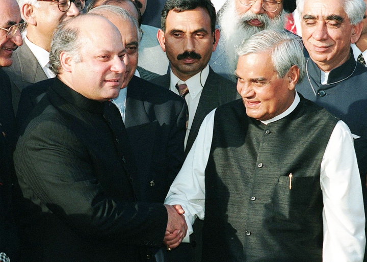in this photograph taken on february 20 1999 then prime minister of pakistan nawaz sharif l receives his then indian counterpart atal behari vajpayee r at the wagah border crossing between india and pakistan after the first regular bus service between the two countries photo afp