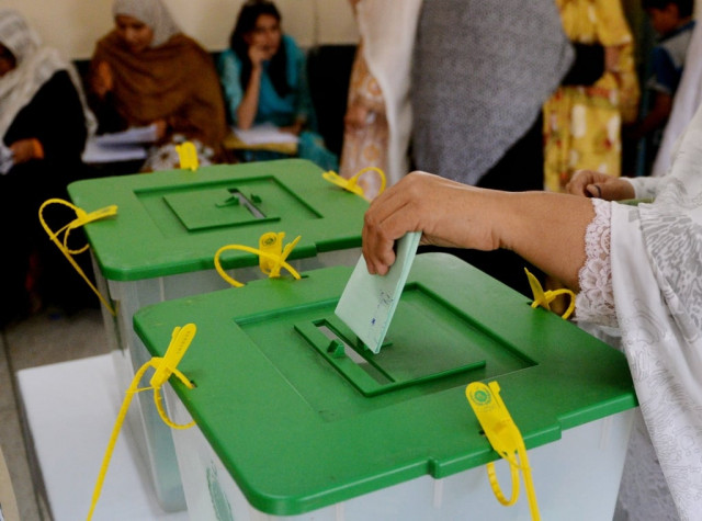 the report commends the ecp s efforts to reach out to female voters and set up more polling stations to make reaching them more convenient photo afp the report commends the ecp s efforts to reach out to female voters and set up more polling stations to make reaching them more convenient photo afp