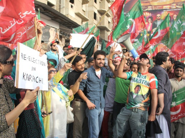 pti supporters protest against rigging in may 11 polls at teen talwar karachi on may 12 2013 photo ayesha mir
