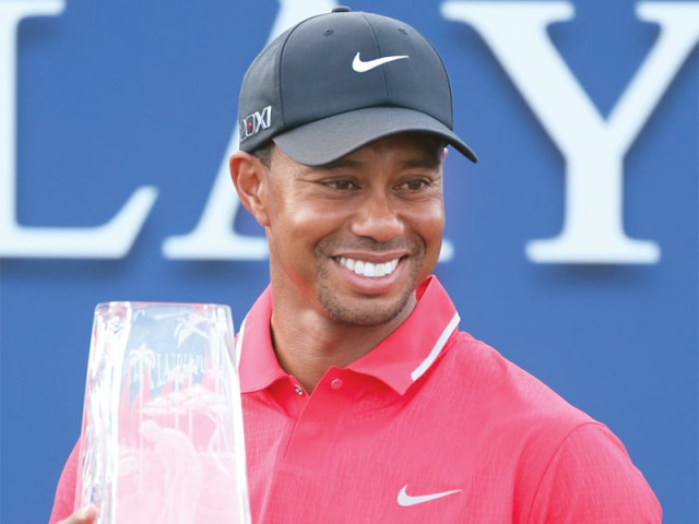 tiger woods claimed his second tpc sawgrass title after securing victory over co leader sergio garcia photo afp tiger woods claimed his second tpc sawgrass title after securing victory over co leader sergio garcia photo afp