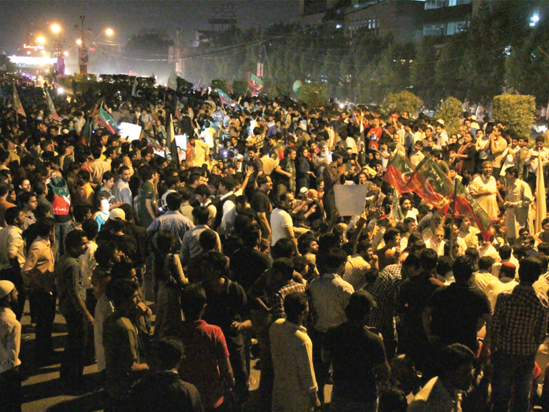 once again the residents of karachi gathered to protest the blatant rigging that took place during the polls on saturday this time though the activists made sure they carried the flag of pakistan and not their respective political party flags photo ayesha mir express