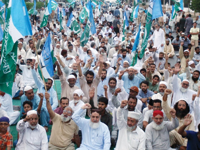 protesters including jamaat e islami s karachi chief muhammad hussain mehanti sitting outside quaid e azam s mausoleum where the party had organised a gathering against rigging they demanded fresh elections in all constituencies of the city photo inp protesters including jamaat e islami s karachi chief muhammad hussain mehanti sitting outside quaid e azam s mausoleum where the party had organised a gathering against rigging they demanded fresh elections in all constituencies of the city photo inp