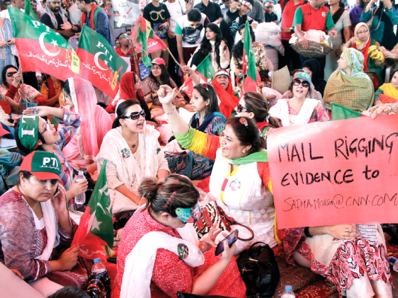 the sit in began on sunday evening following a flood of calls for protest against alleged rigging in na 125 on social media networks photo shafiq malik