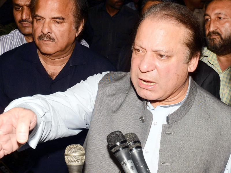 pml n chief talking to media outside shaukat khanum memorial hospital after meeting with pakistan tehreek e insaf chairman imran khan photo tariq hassan express