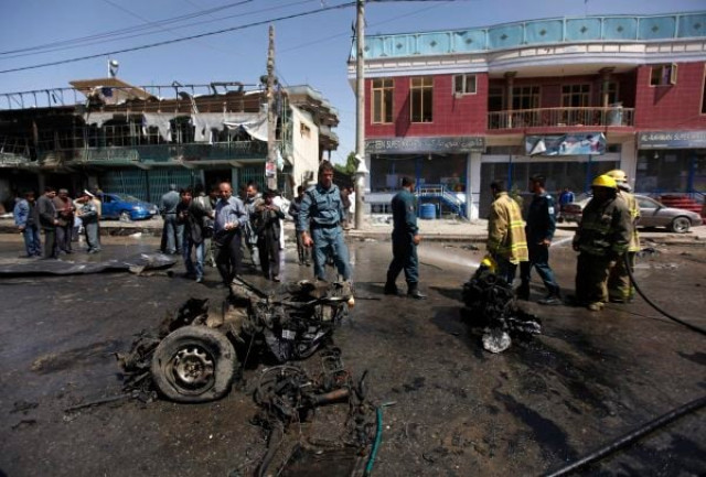 afghan policemen stand guard at the site of a suicide attack in kabul may 16 2013 photo reuters afghan policemen stand guard at the site of a suicide attack in kabul may 16 2013 photo reuters