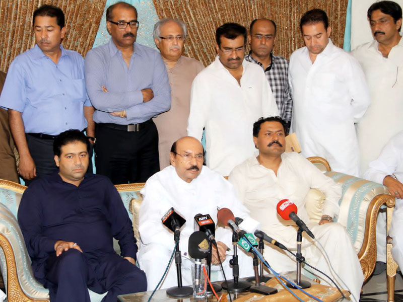 president of ppp sindh qaim ali shah c ppp candidate from thatta owais muzaffar l and chief of the malkani clan muhammad ali malkani speak to media during a press conference on thursday photo express mohommad saquib