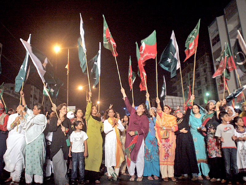 pakistan tehreek e insaf supporters who continued the protest despite water cannons brought in by clifton and defense police erupted into cheers when they heard mqm had decided to boycott re polls for na 250 photo athar khan express