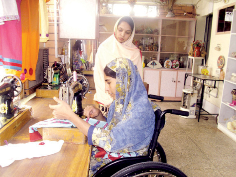 shaheen begum receives skills training at the ppc paraplegic centre in hayatabad in northern pakistan photo ips