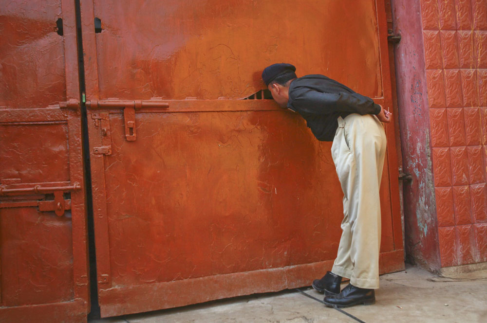 a policeman looks into a prison at dozens of fishermen from india before their release in karachi april 14 2011 photo reuters file
