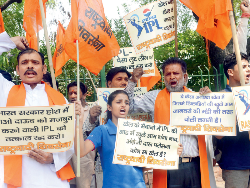 activists from shiv sena chant slogans as they demand the banning of the indian premier league twenty20 cricket tournament during a protest in new delhi photo afp